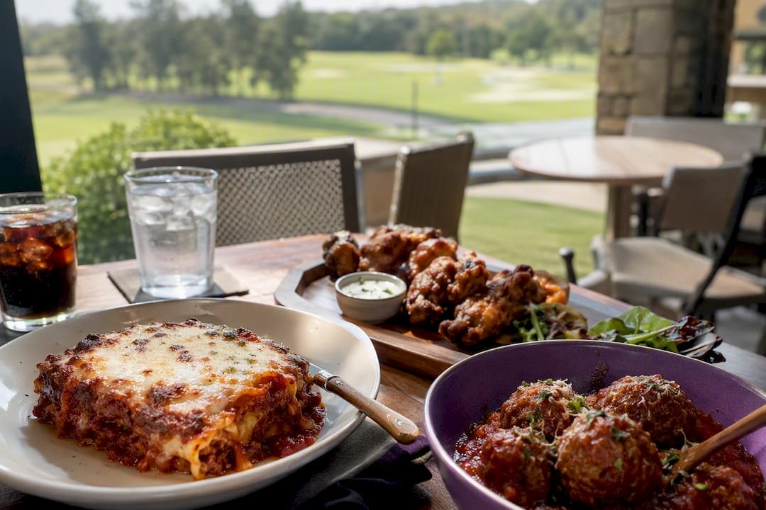 Elevated pub fare dishes at golf course restaurant