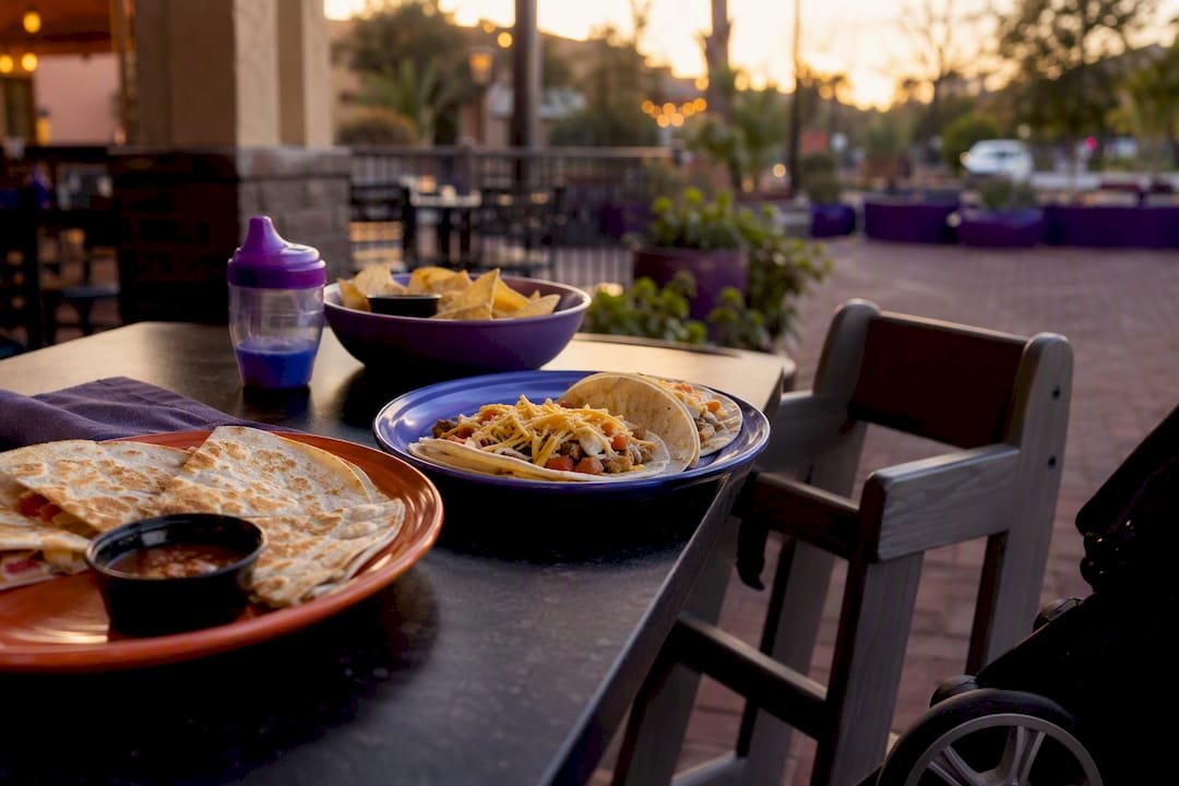 Kid-friendly Mexican food on patio table