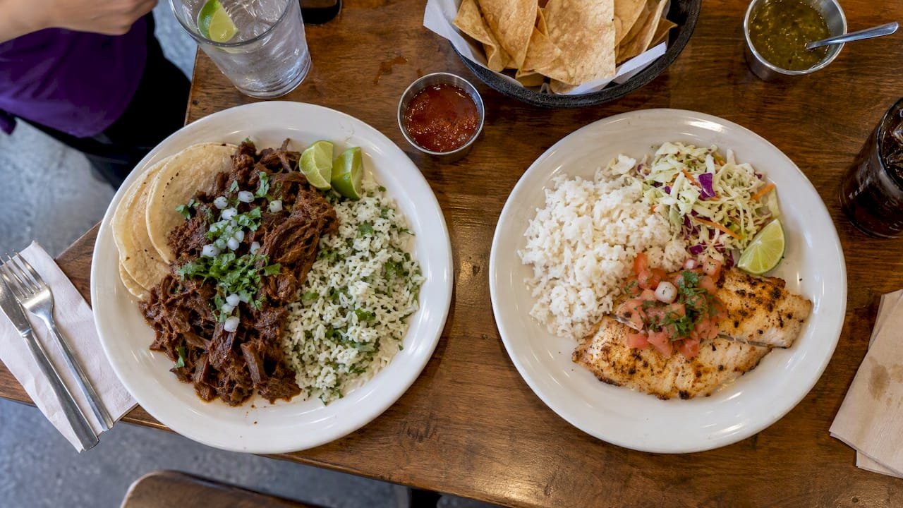 Cilantro lime rice beside barbacoa and fish