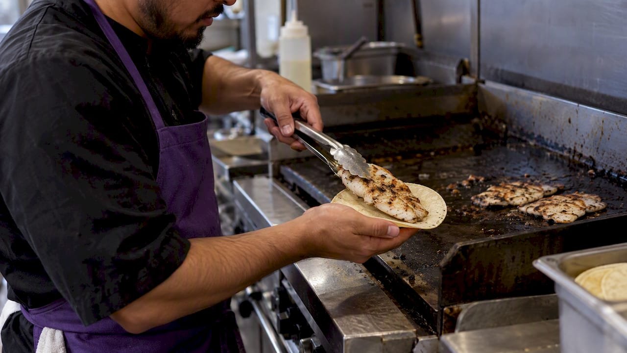 Grilled fish fillet in a corn tortilla